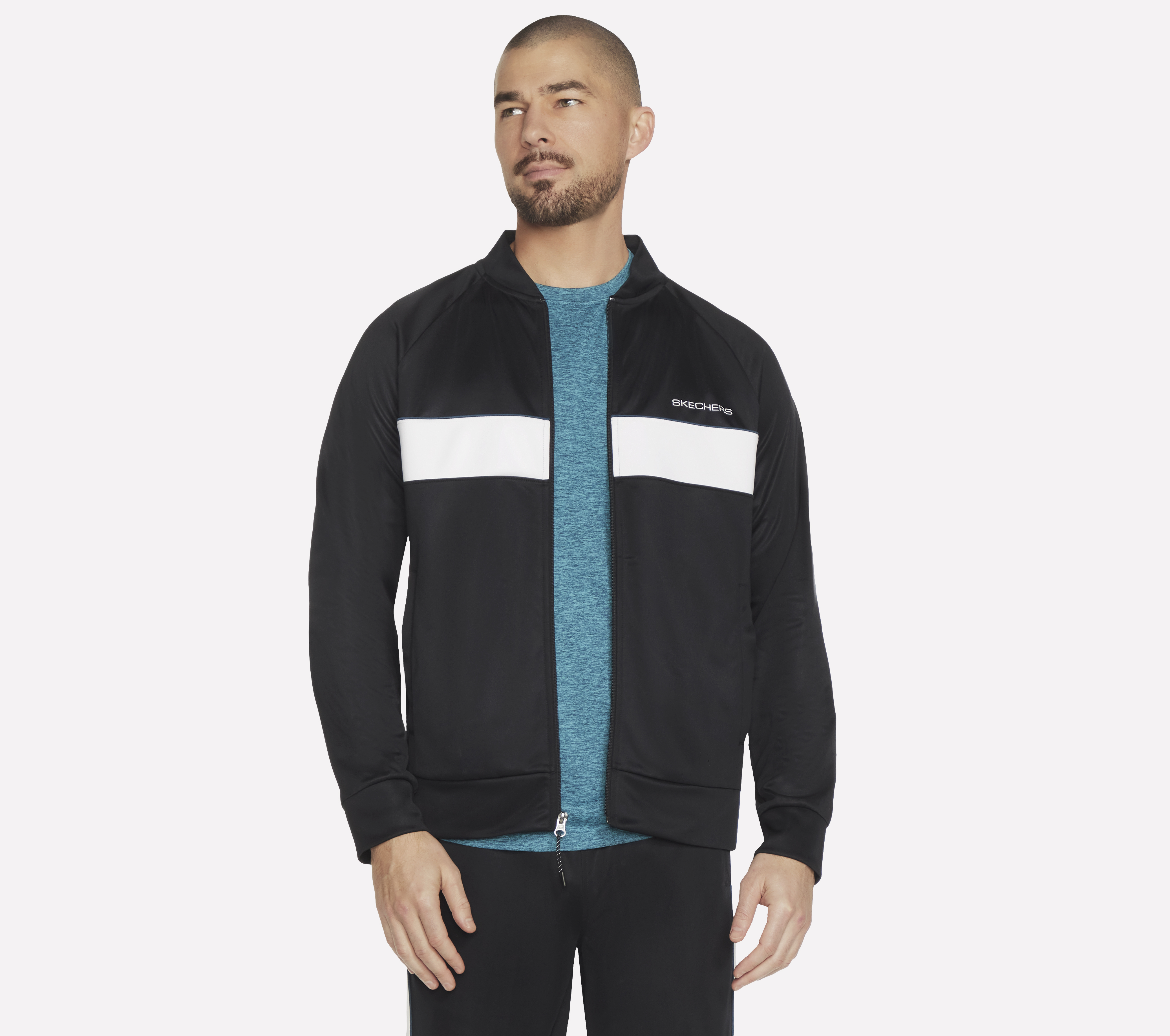 Skechers SKECHTECH Premier Track chaqueta en Negro, talla Grande